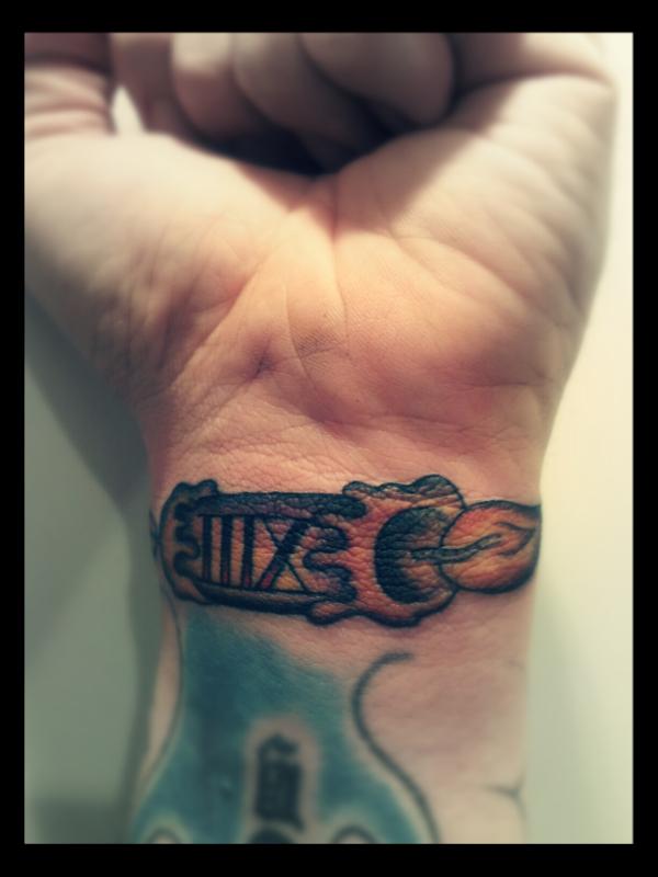 xiii tattoo wrist