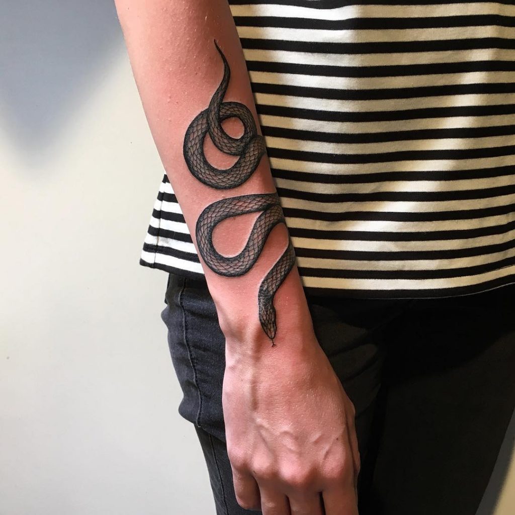 Six Snake Tattoos We Love