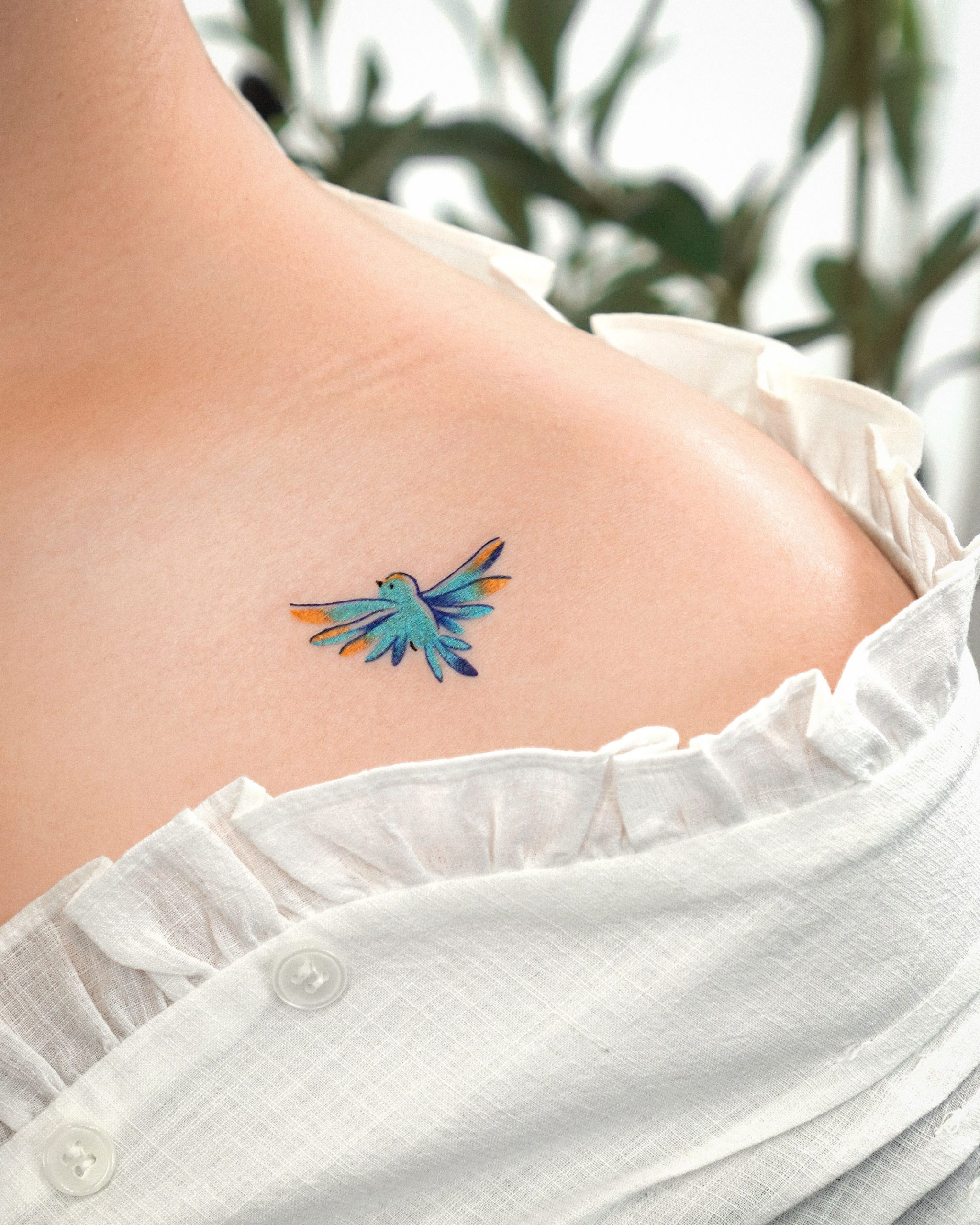 Delfts Blue bird and flower tattoo