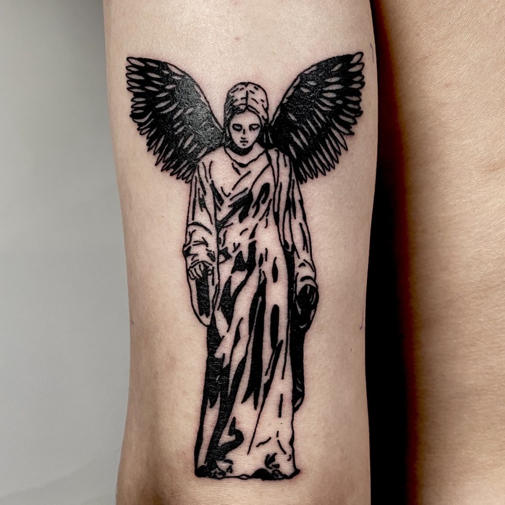 Black angel tattoo