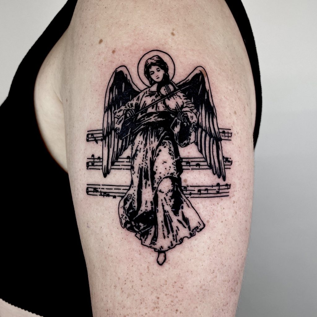 Black angel tattoo