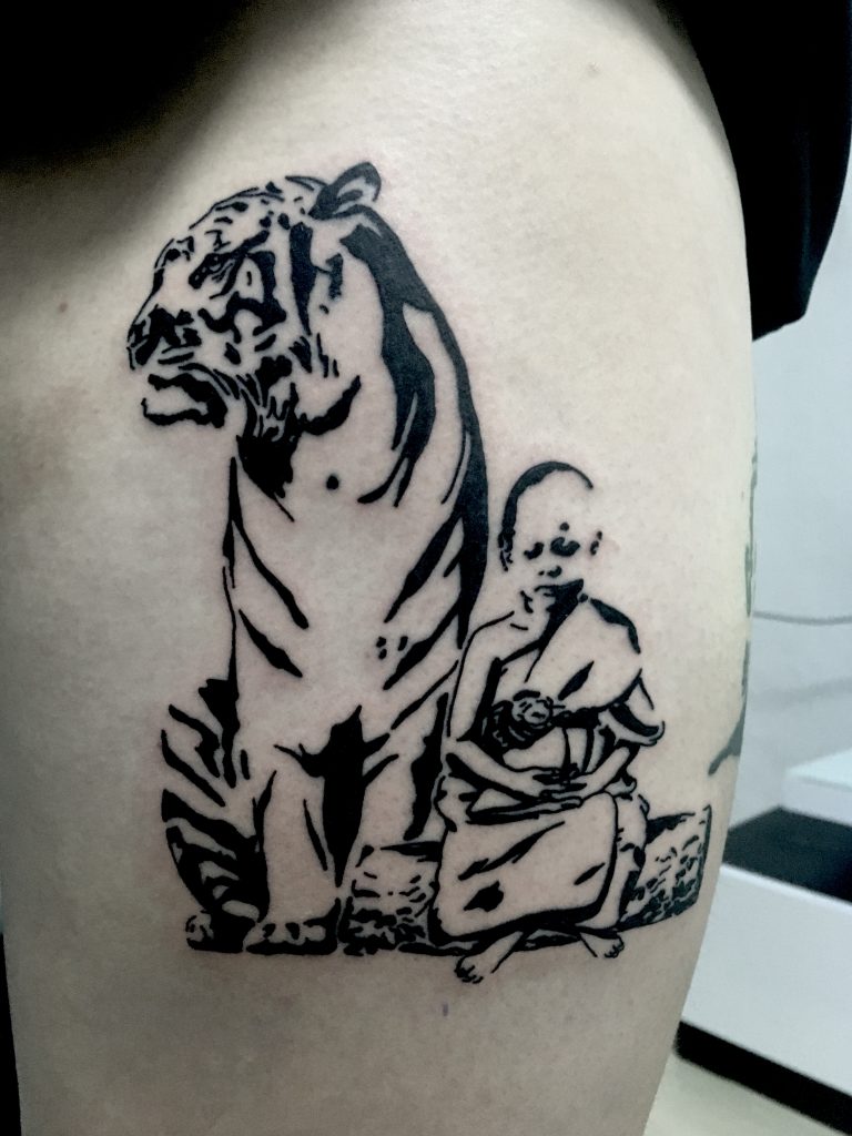 Black tiger and monk tattoo