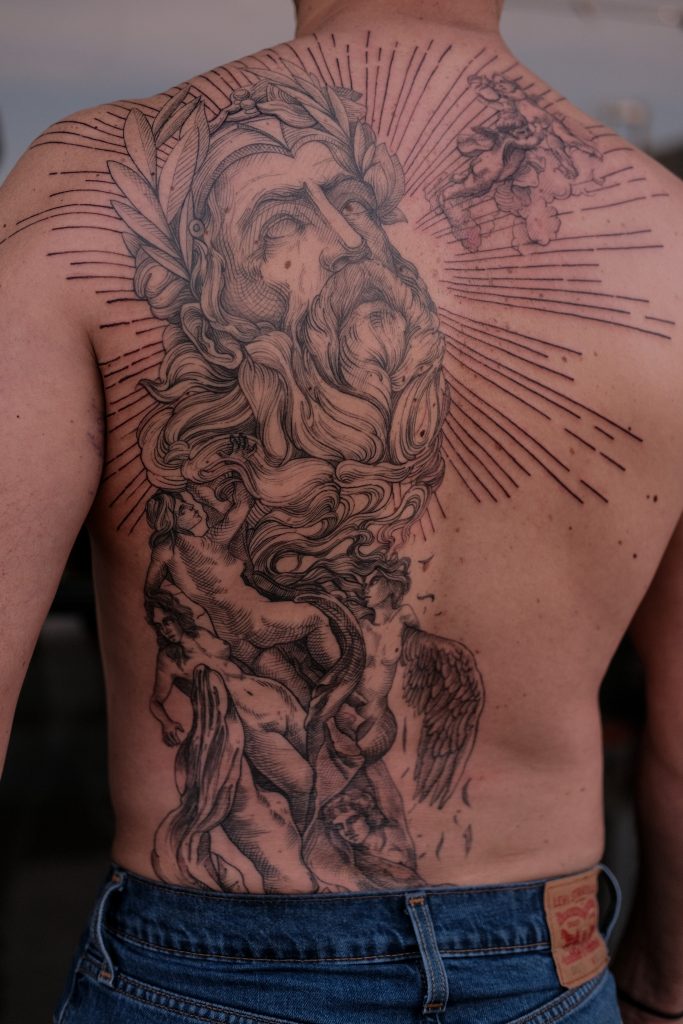 Greek god tattoo