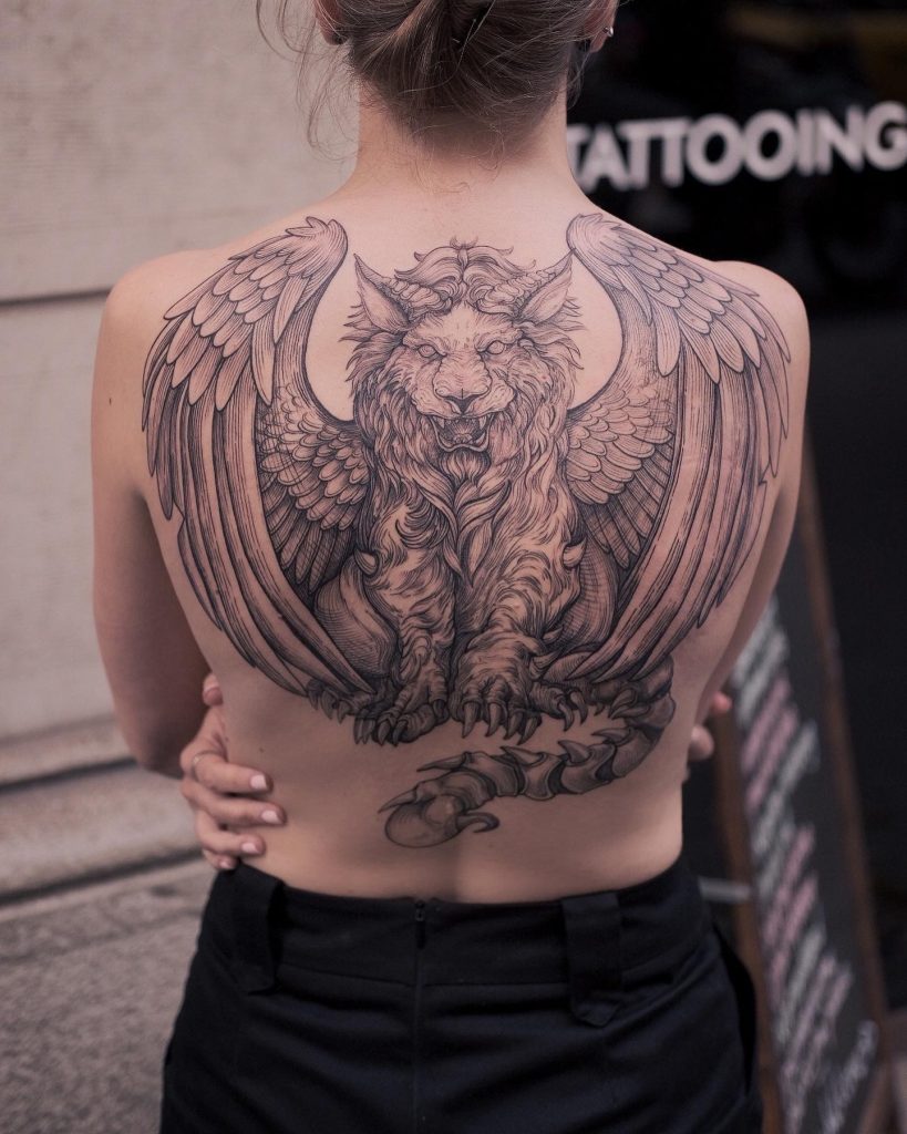 Winged lion Gravure tattoo