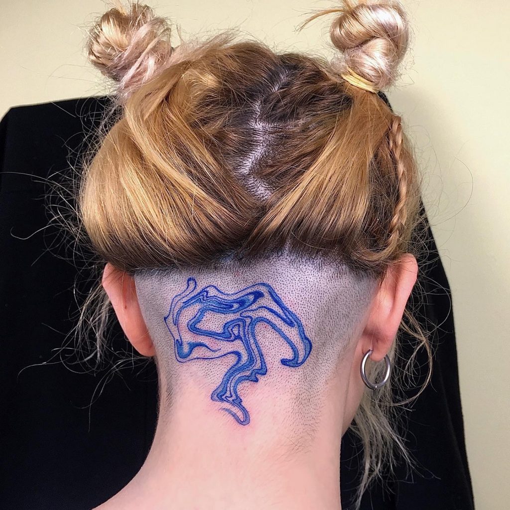 Blue abstract tattoo on head