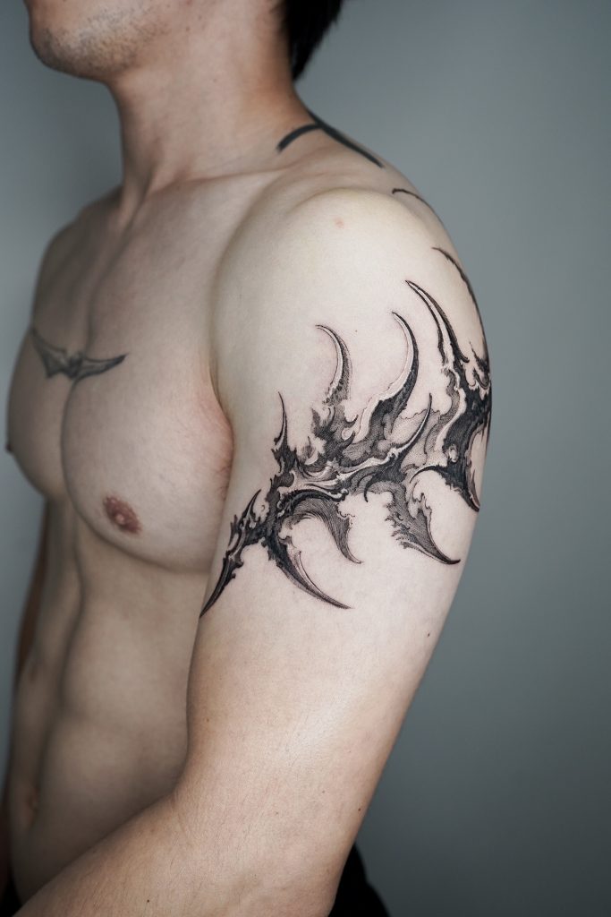 Black bone cyber industrial tattoo on arm